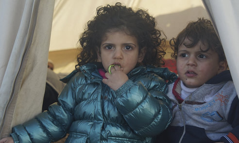 Underaged refugees in a camp located at the northeastern Greek island of Lesbos,  30 January 2016.